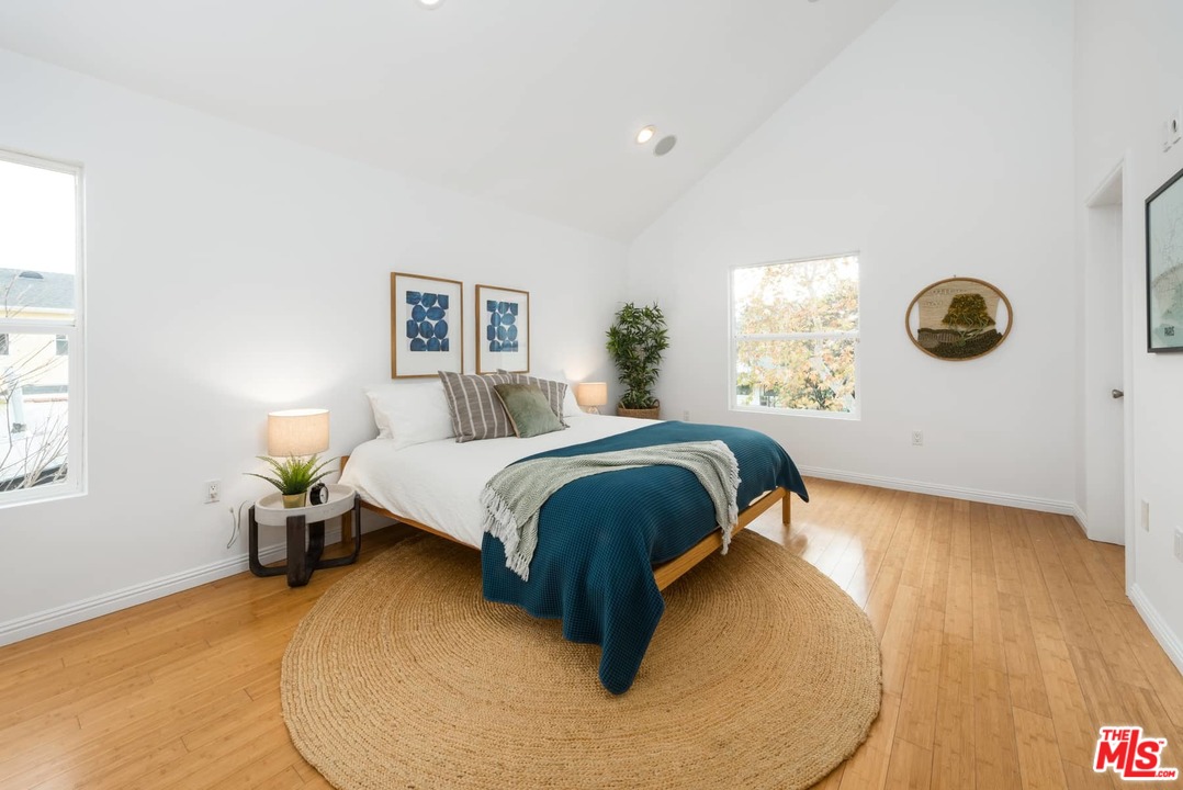 3421 Ferncroft Road Los Angeles, CA 90039 - Photo 15 of 35 a bedroom with a bed and wall painting