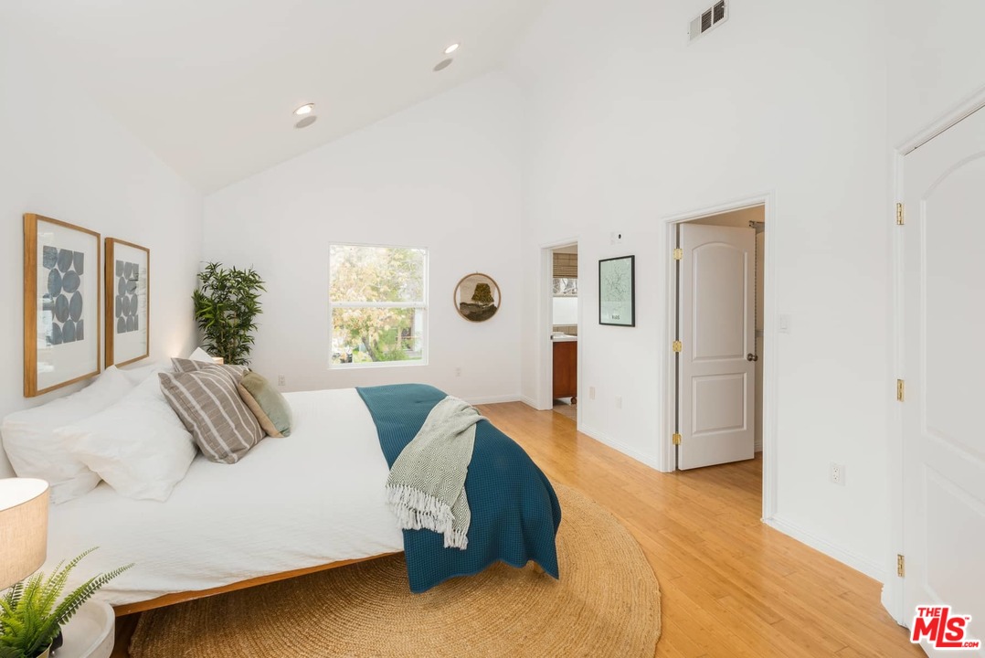 3421 Ferncroft Road Los Angeles, CA 90039 - Photo 16 of 35 a bedroom with a bed and a couch