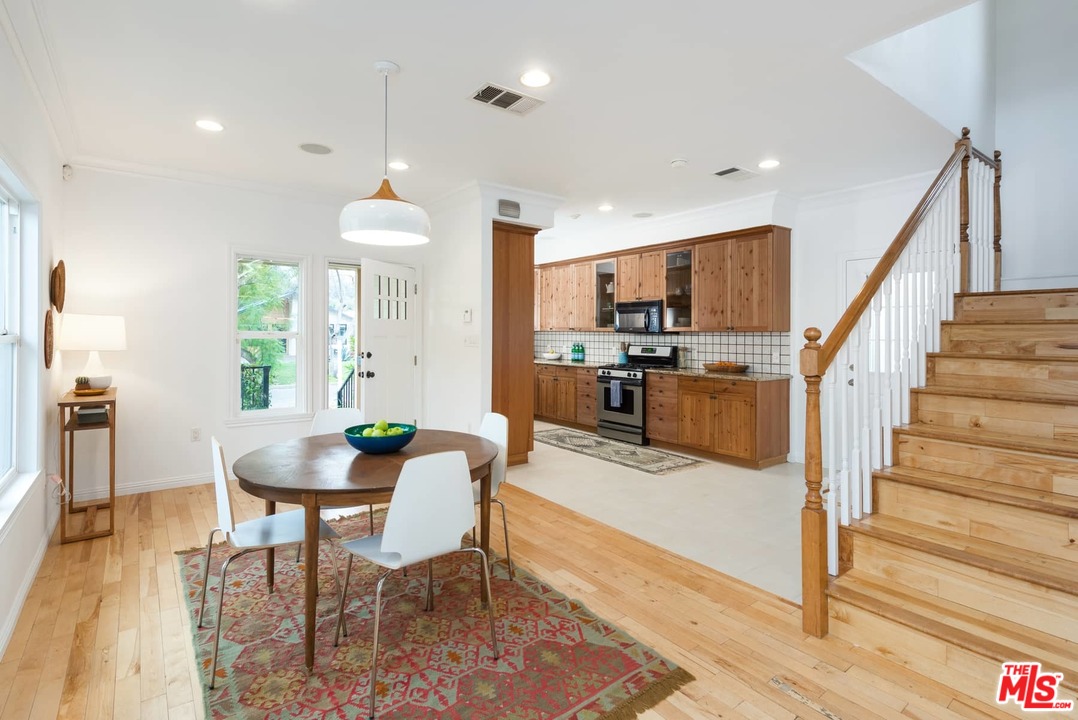 3421 Ferncroft Road Los Angeles, CA 90039 - Photo 3 of 35 a dining room with furniture and wooden floor