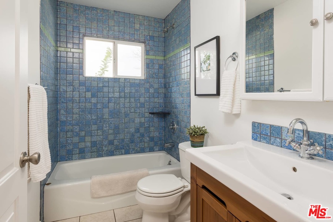 3421 Ferncroft Road Los Angeles, CA 90039 - Photo 22 of 35 a bathroom with a sink a toilet and shower