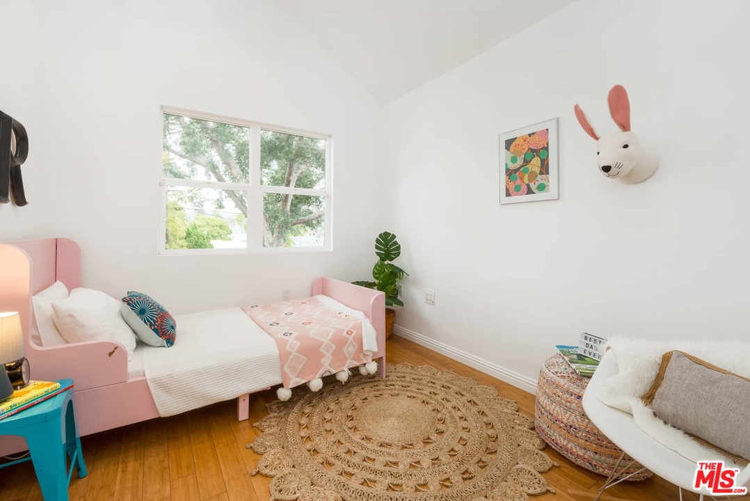 3421 Ferncroft Road Los Angeles, CA 90039 - Photo 23 of 35 a bed room with a bed and a couch