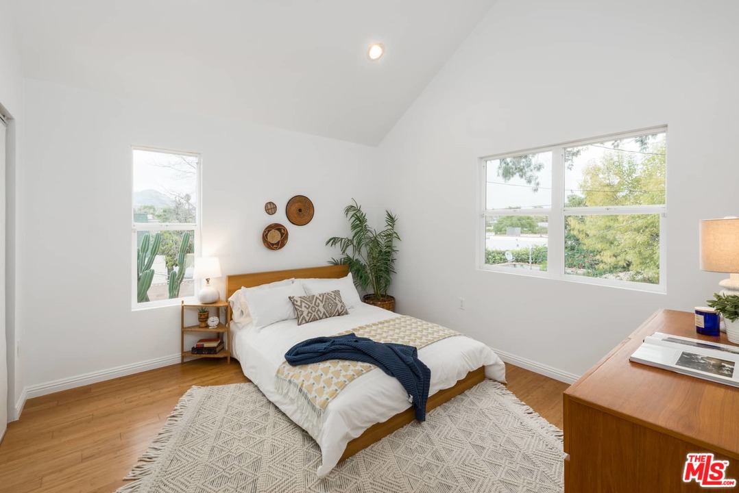 3421 Ferncroft Road Los Angeles, CA 90039 - Photo 24 of 35 a bedroom with a bed and a window