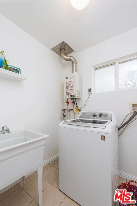 3421 Ferncroft Road Los Angeles, CA 90039 - Photo 26 of 35 a kitchen with a sink cabinets and window