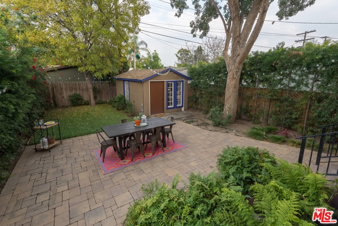 3421 Ferncroft Road Los Angeles, CA 90039 - Photo 27 of 35 a view of a wooden bench sitting in middle of the garden