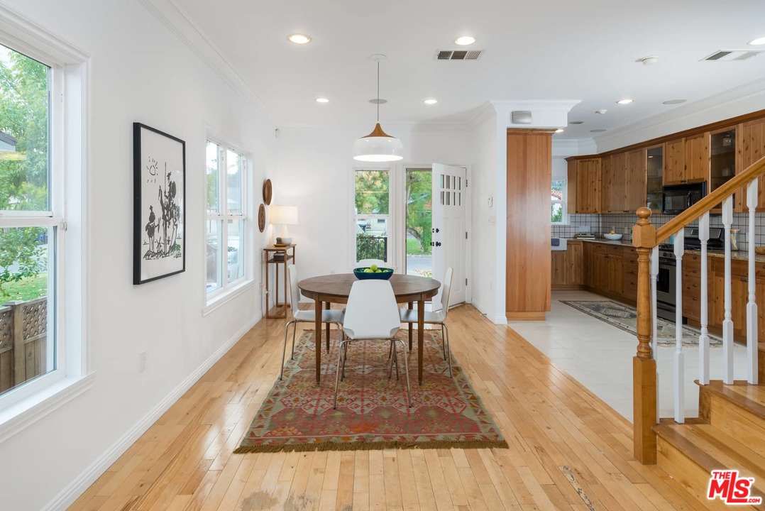 3421 Ferncroft Road Los Angeles, CA 90039 - Photo 4 of 35 a view of a dining room with furniture window and outside view
