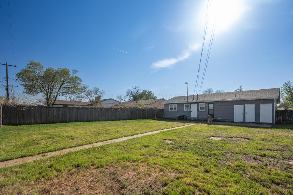 2909 South Marrs Street Amarillo, TX 79103 - Photo 18 of 21 a view of a swimming pool with an ocean view