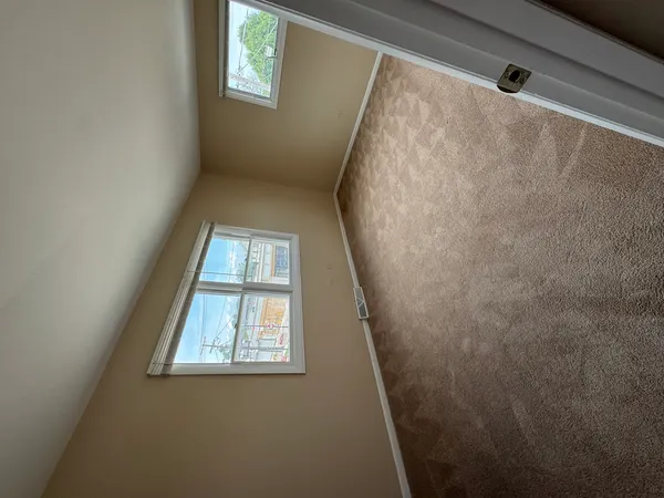 a view of a window in an empty room