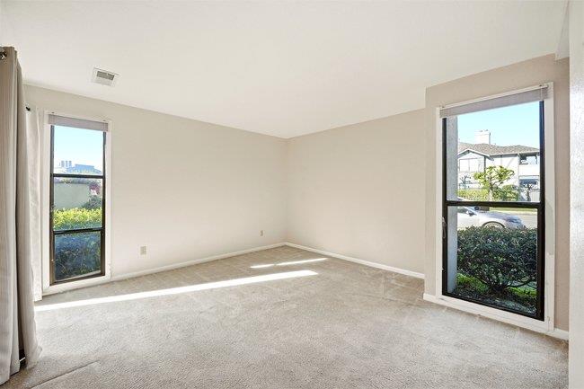 1067 Padre Drive, Unit 2 Salinas, CA 93901 - Photo 11 of 24 an empty room with windows