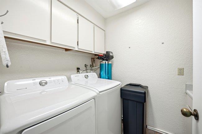 1067 Padre Drive, Unit 2 Salinas, CA 93901 - Photo 18 of 24 a utility room with dryer and washer