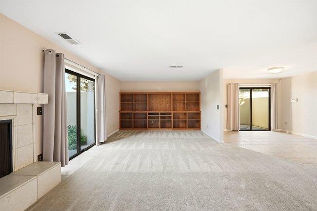 1067 Padre Drive, Unit 2 Salinas, CA 93901 - Photo 6 of 24 an empty room with windows