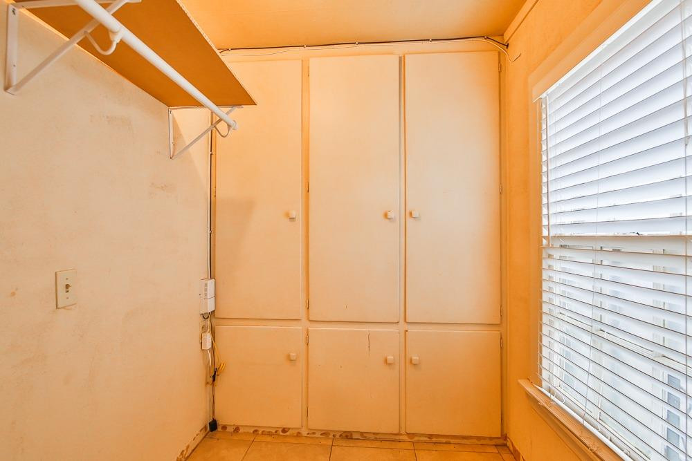 2318 29th Street Lubbock, TX 79411 - Photo 13 of 32 a view of a bathroom with a shower