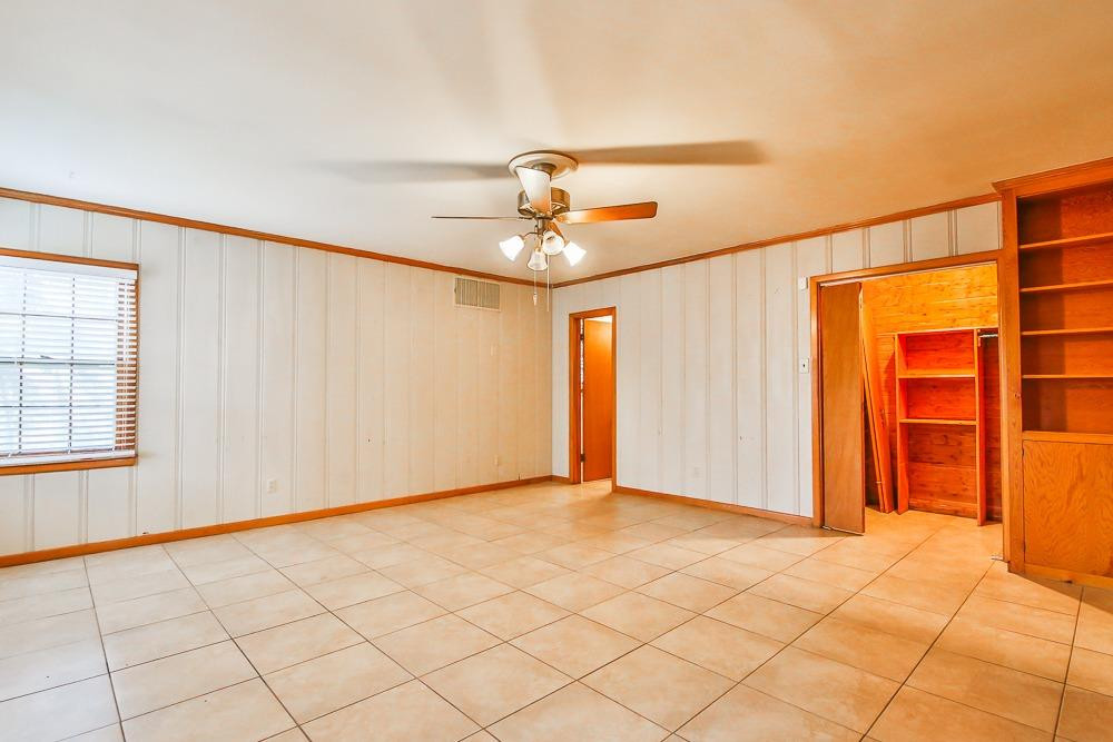 2318 29th Street Lubbock, TX 79411 - Photo 14 of 32 a view of an empty room with a window