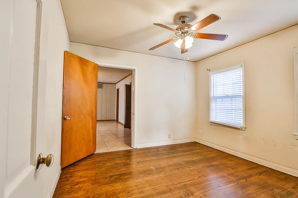 2318 29th Street Lubbock, TX 79411 - Photo 22 of 32 a view of an empty room with a window