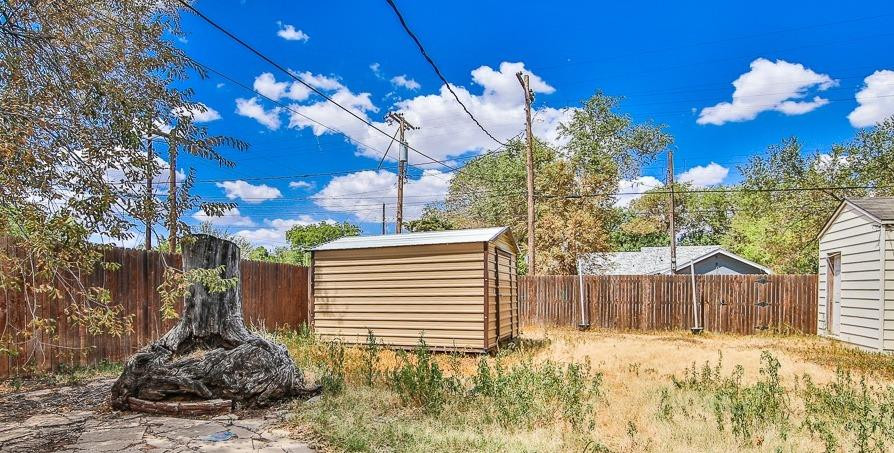 2318 29th Street Lubbock, TX 79411 - Photo 29 of 32 a view of a house with a yard and pathway