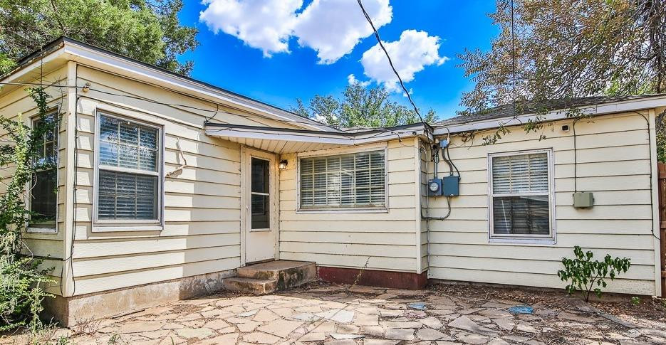 2318 29th Street Lubbock, TX 79411 - Photo 30 of 32 a view of a house with a yard