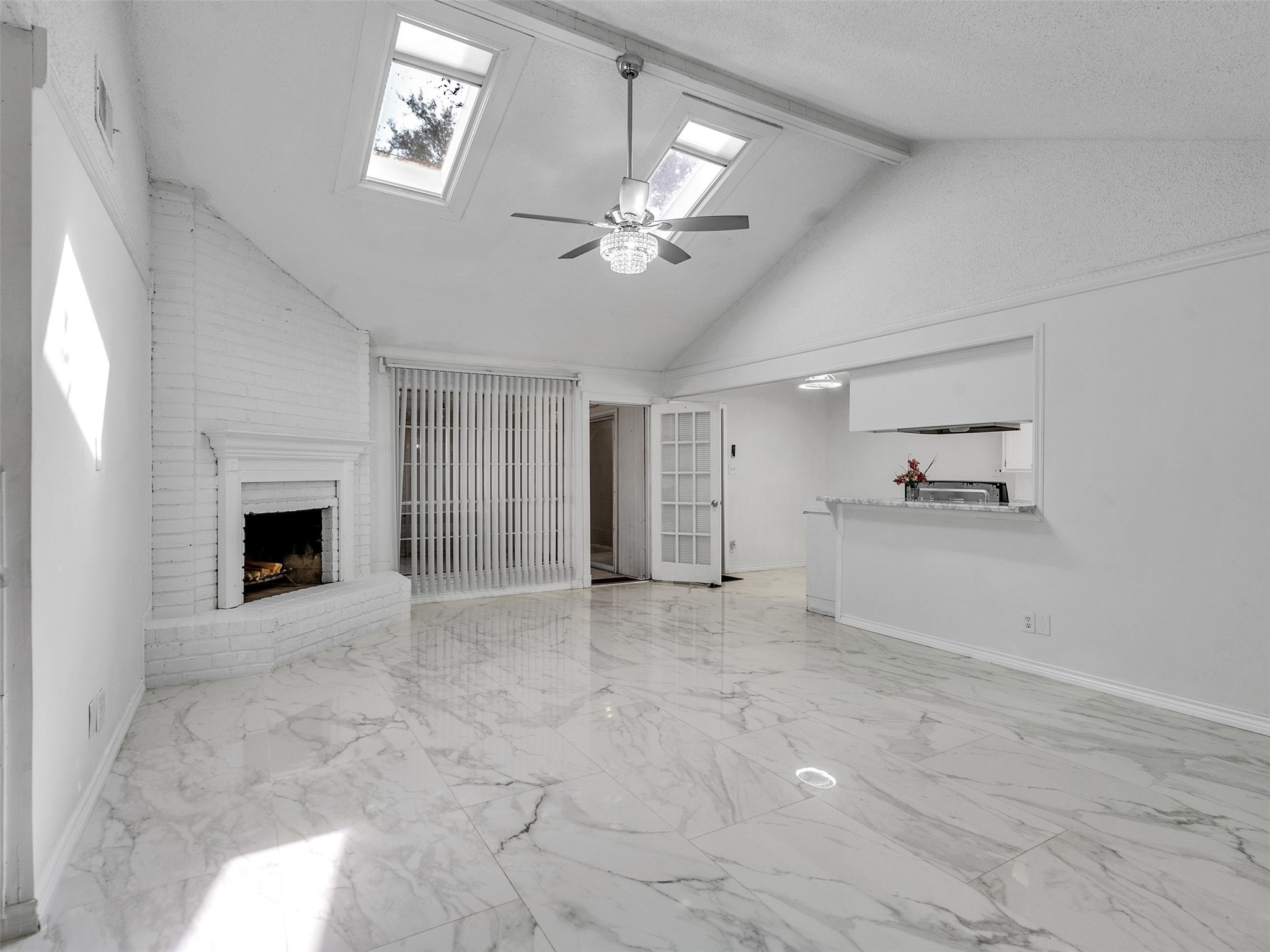 5602 Rivergate Drive Spring, TX 77373 - Photo 4 of 20 Spacious living room with sky lights and cozy fireplace