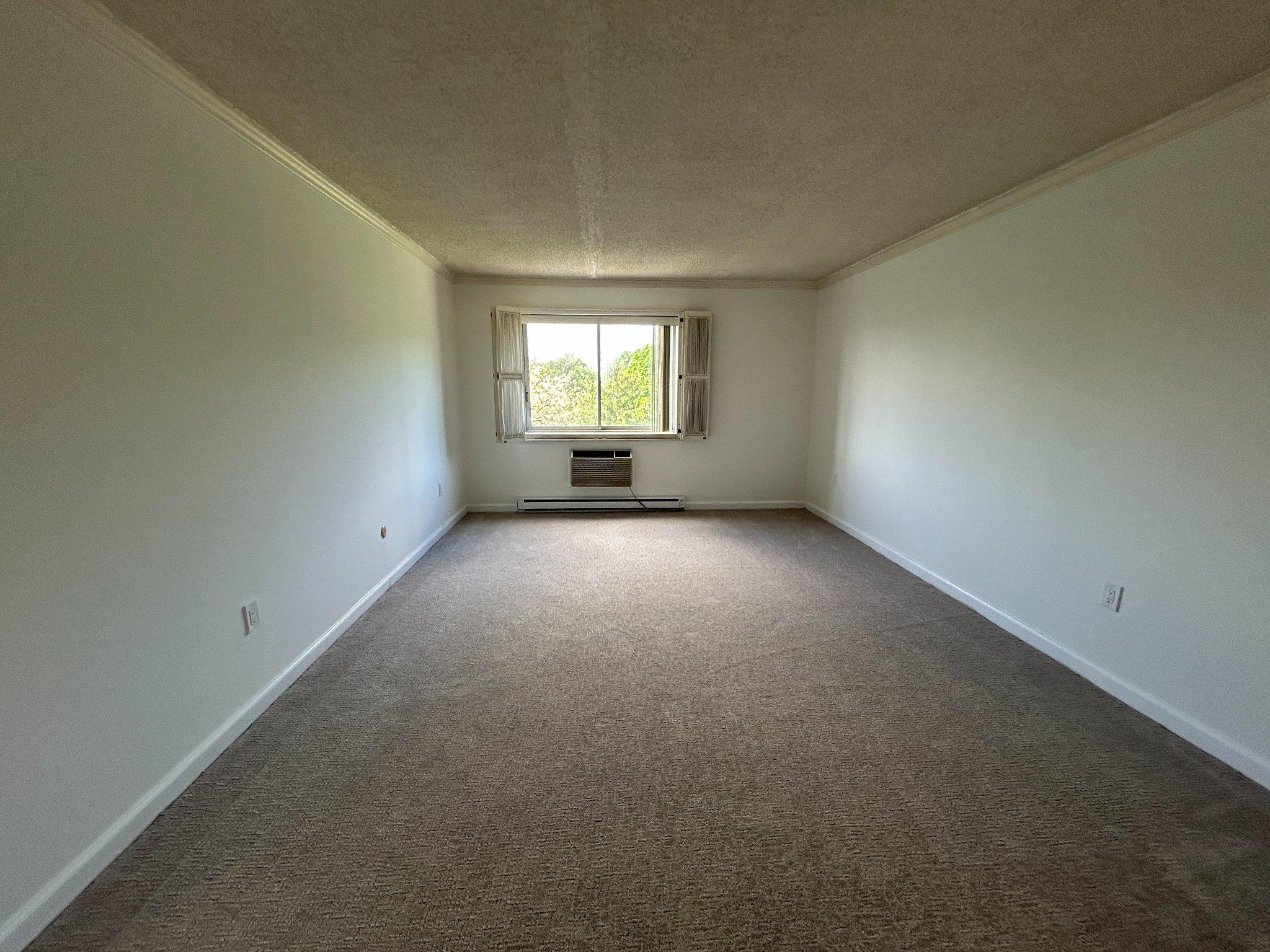 860 Lower Ferry Road, Unit 6M Ewing, NJ 08628 - Photo 12 of 16 an empty room with windows