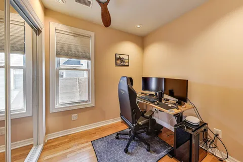 a workspace with furniture and a window
