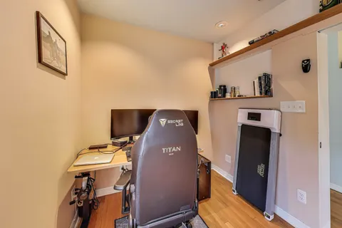 a view of workspace with wooden floor