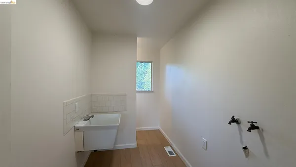 an aerial view of a houses with outdoor space