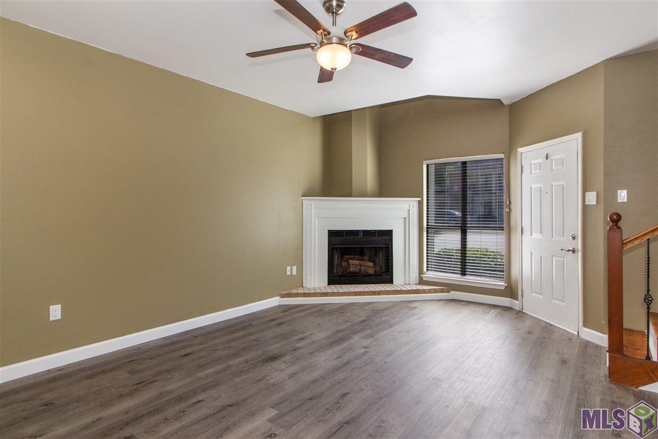 8545 Summa Avenue, Unit 1 Baton Rouge, LA 70809 - Photo 2 of 13 Living room with Fireplace