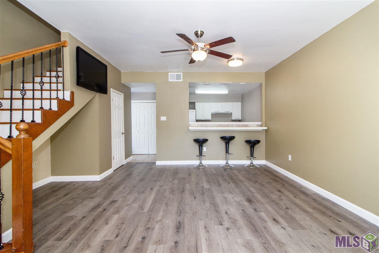 8545 Summa Avenue, Unit 1 Baton Rouge, LA 70809 - Photo 3 of 13 Living room/Kitchen
