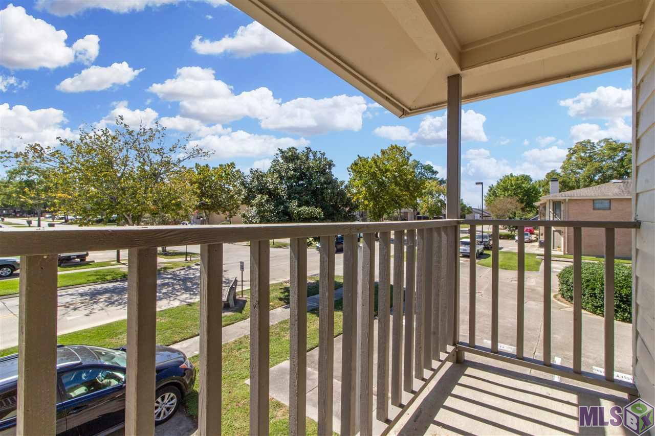 8545 Summa Avenue, Unit 1 Baton Rouge, LA 70809 - Photo 8 of 13 balcony from bedroom
