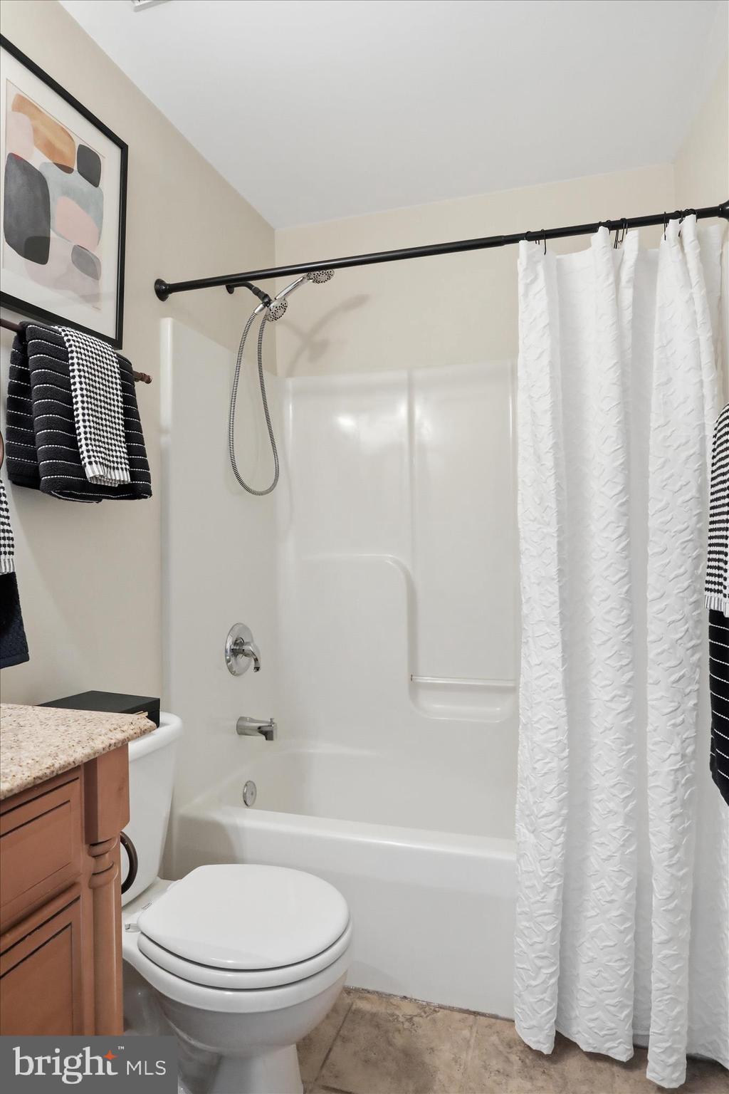 88 Grassy Meadow Road Charles Town, WV 25414 - Photo 22 of 44 a bathroom with a toilet and a shower