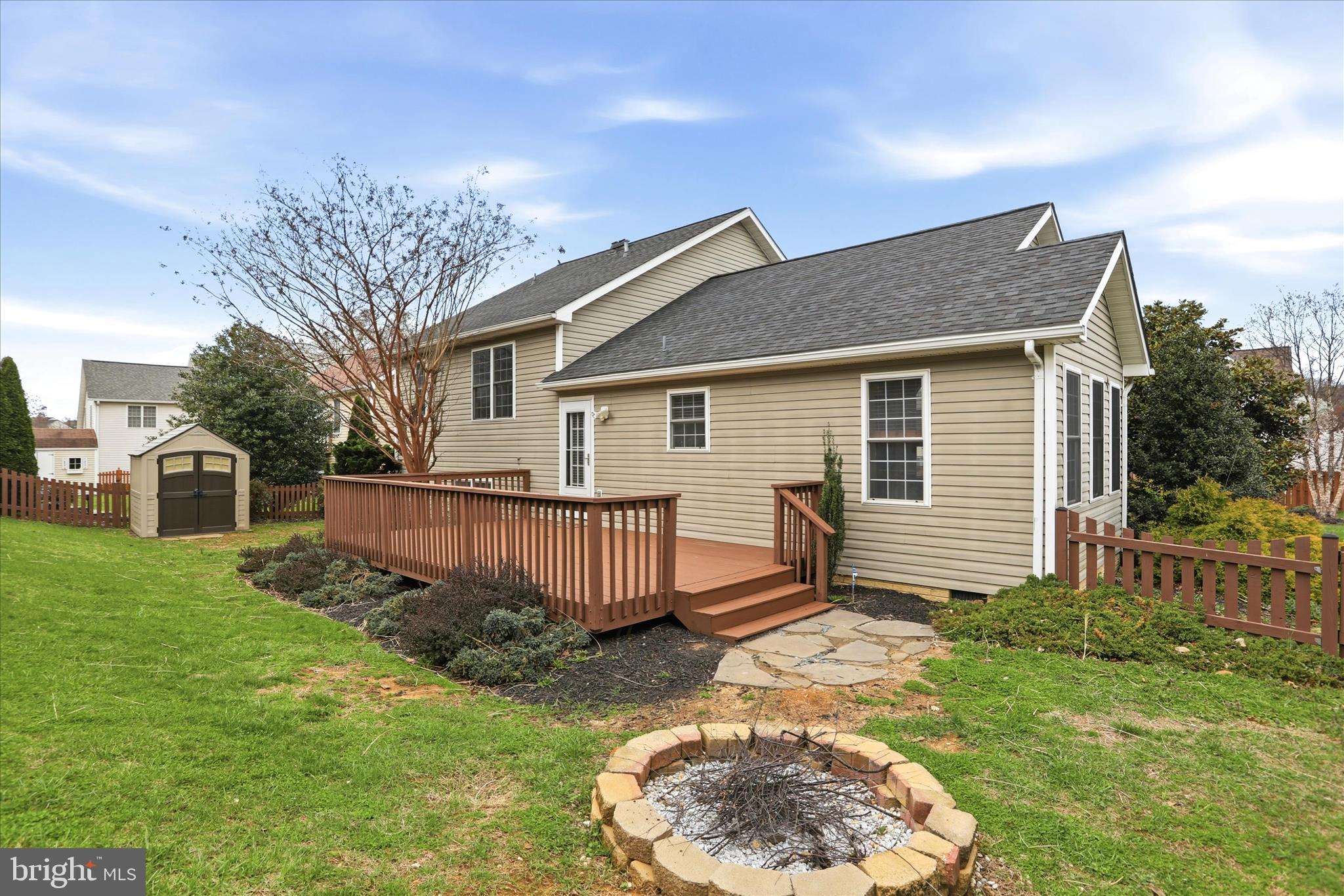 88 Grassy Meadow Road Charles Town, WV 25414 - Photo 3 of 44 a view of a house with a yard