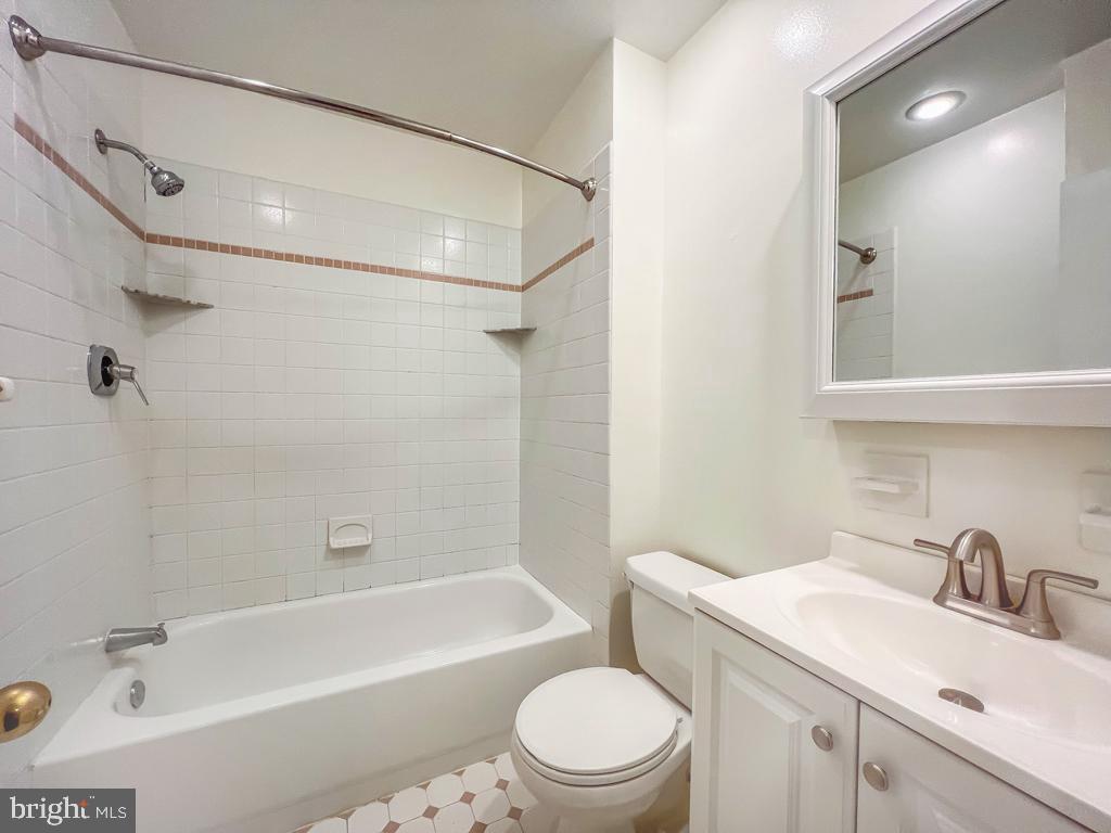 10843 Academy Road Philadelphia, PA 19154 - Photo 18 of 30 a bathroom with a sink toilet and shower