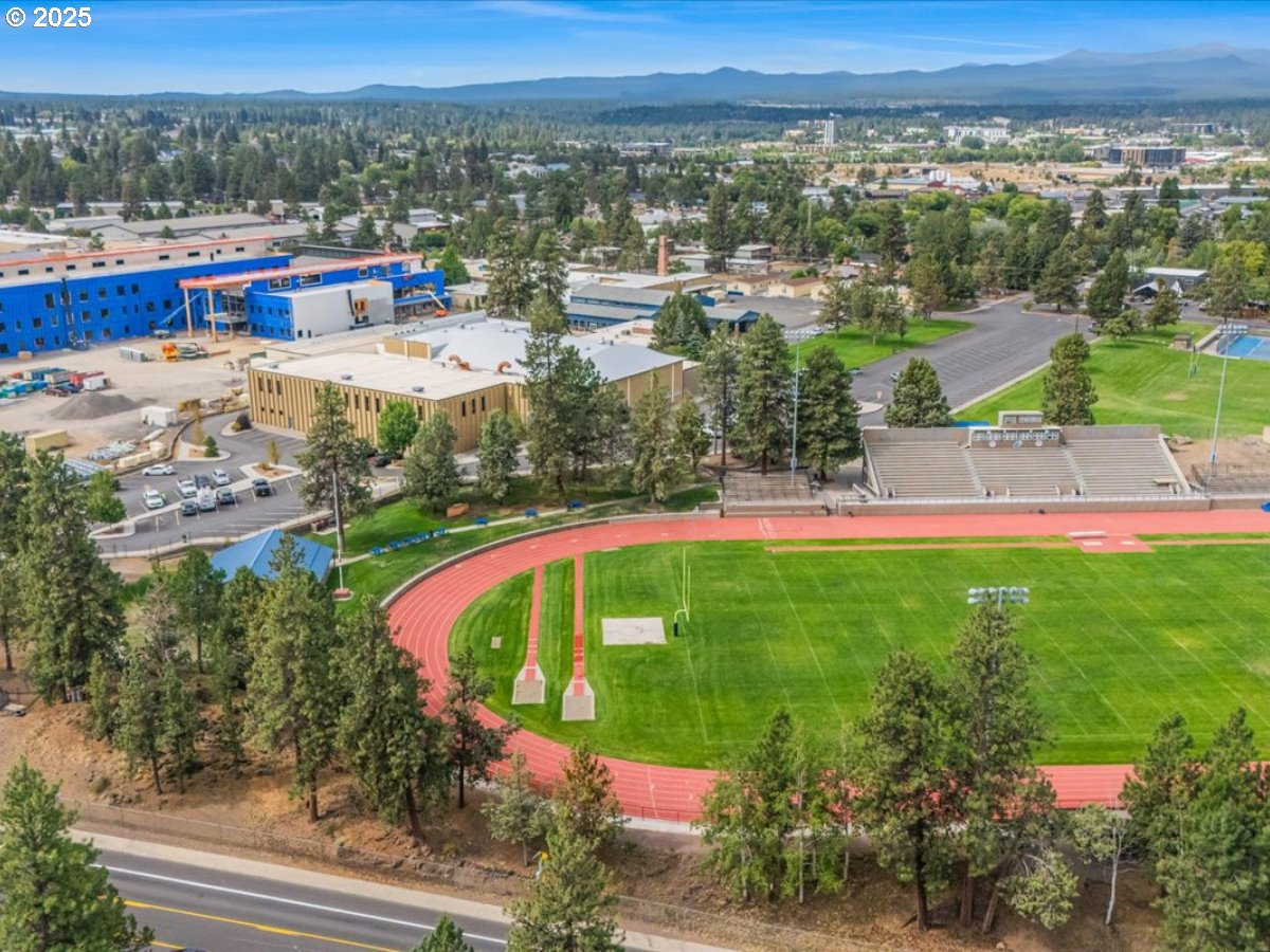 438 Northeast 9th Street Bend, OR 97701 - Photo 22 of 29 an aerial view of a house with a garden and lake view