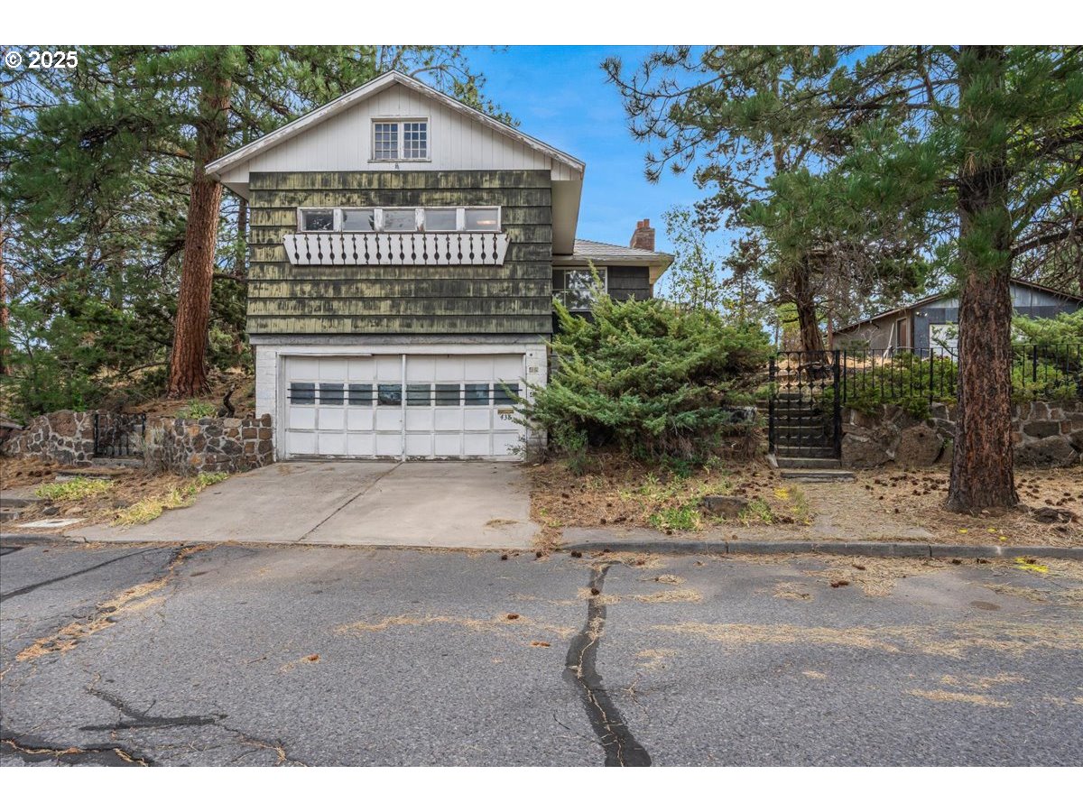 438 Northeast 9th Street Bend, OR 97701 - Photo 6 of 29 a front view of a house with a yard