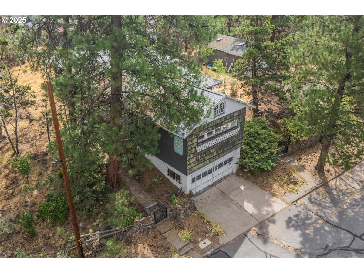 438 Northeast 9th Street Bend, OR 97701 - Photo 9 of 29 a view of a house with a yard