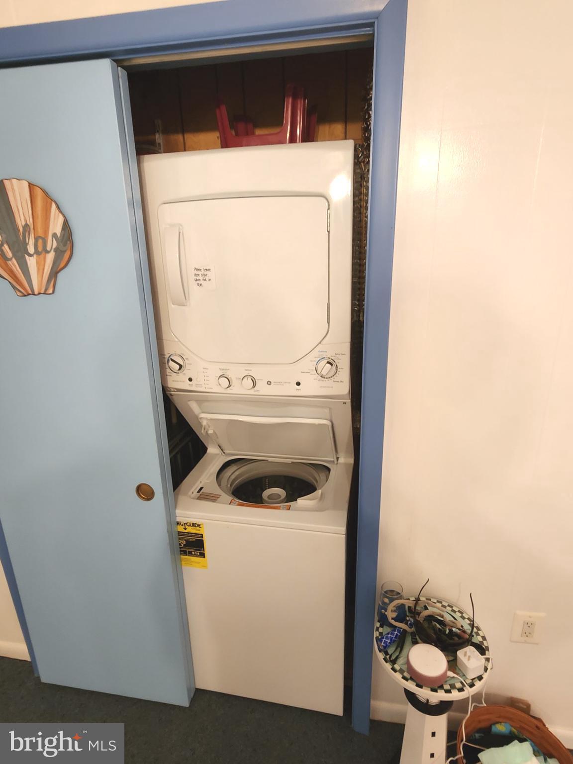 615 Salt Spray Road, Unit 3A Ocean City, MD 21842 - Photo 22 of 23 a utility room with dryer and washer