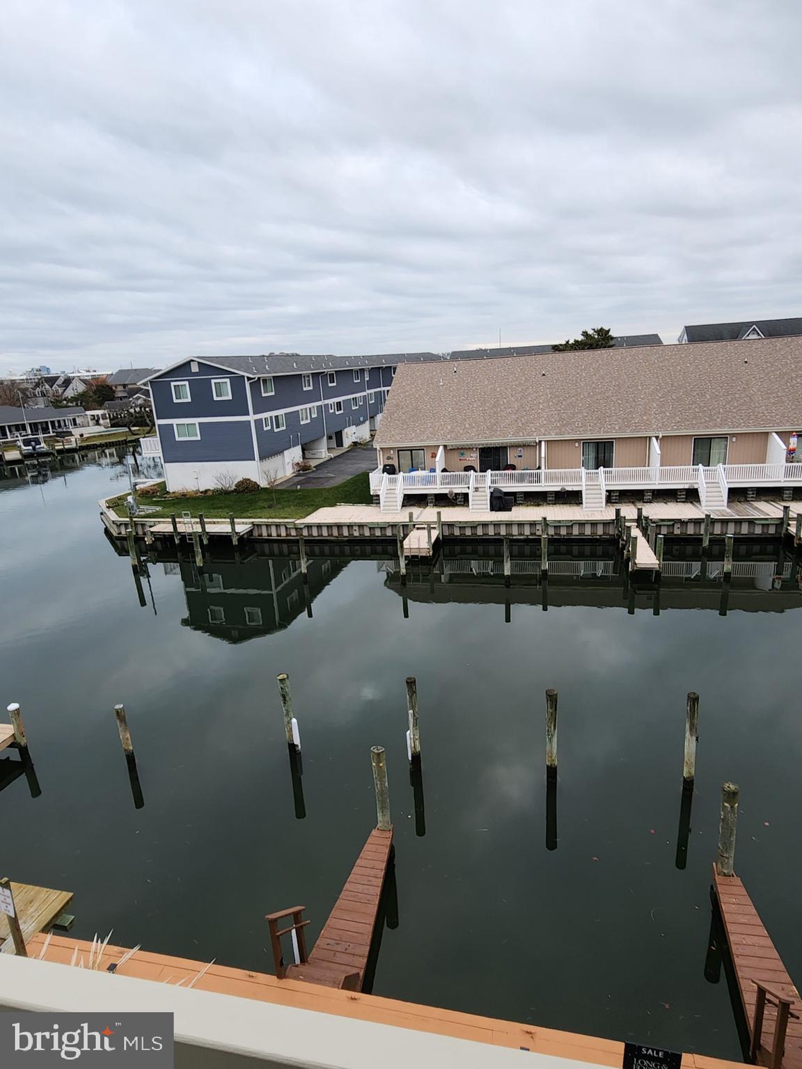 615 Salt Spray Road, Unit 3A Ocean City, MD 21842 - Photo 4 of 23 a view of swimming pool with outdoor seating