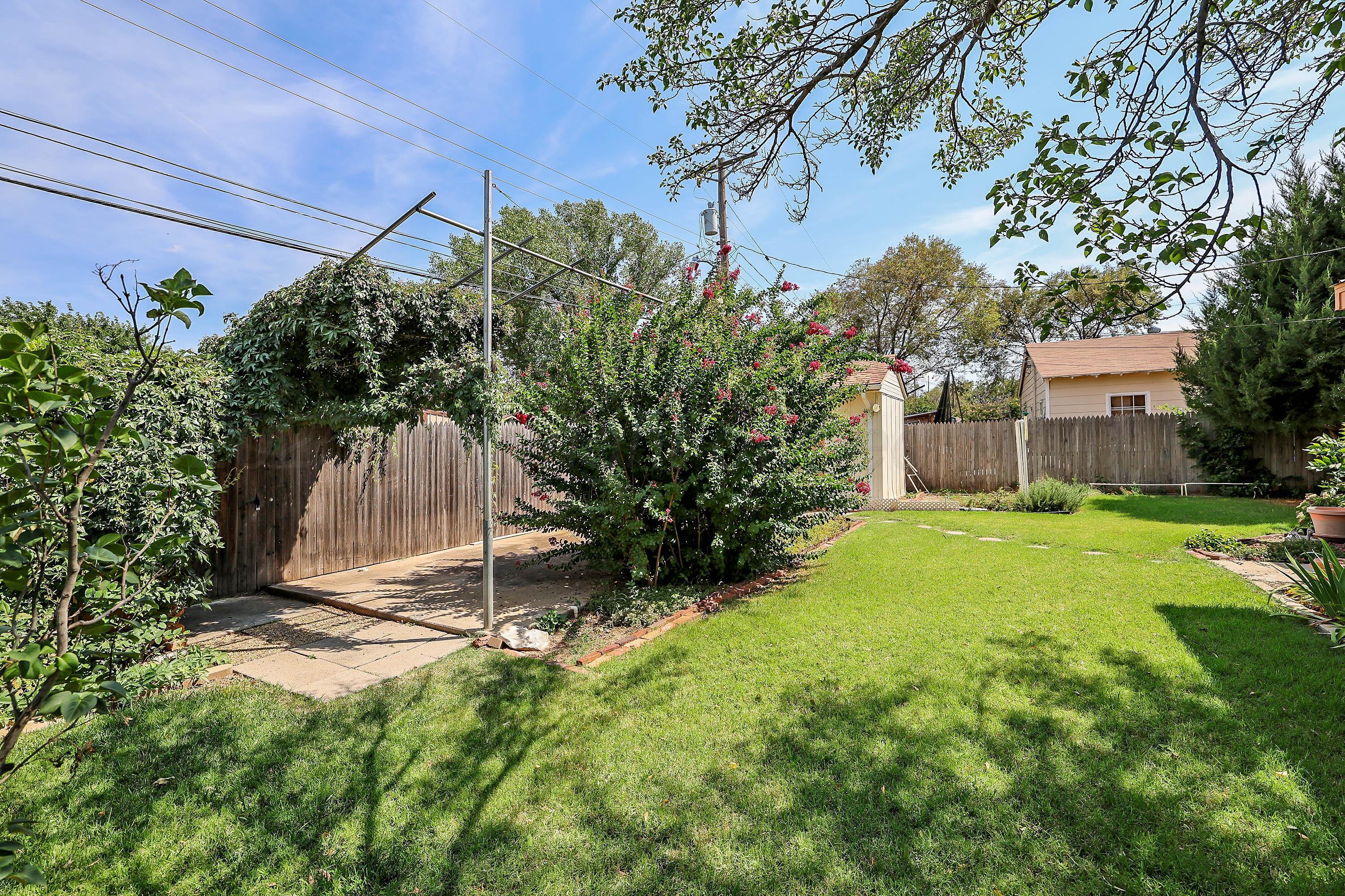 5119 South Bonham Street Amarillo, TX 79110 - Photo 28 of 32 a house view with a garden space