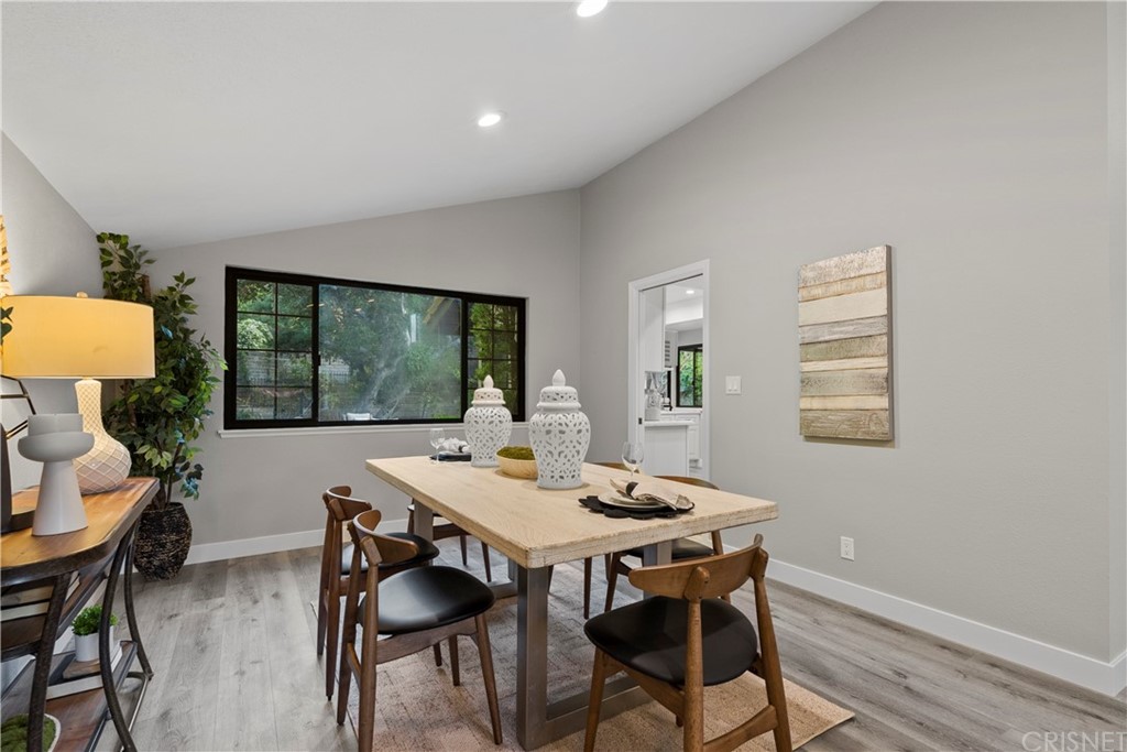 23524 Highland Glen Drive Newhall, CA 91321 - Photo 17 of 53 a view of a dining room with furniture window and outside view
