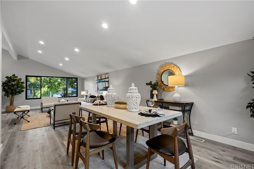 23524 Highland Glen Drive Newhall, CA 91321 - Photo 18 of 53 a view of a dining table and chairs in a room