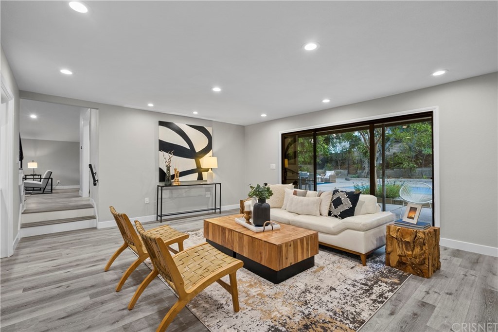 23524 Highland Glen Drive Newhall, CA 91321 - Photo 23 of 53 a living room with furniture and a large window