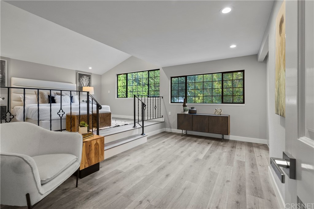 23524 Highland Glen Drive Newhall, CA 91321 - Photo 28 of 53 a living room with furniture and a large window