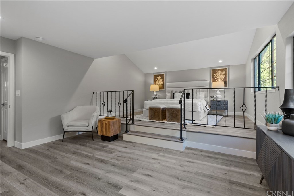 23524 Highland Glen Drive Newhall, CA 91321 - Photo 30 of 53 a living room with furniture and wooden floor
