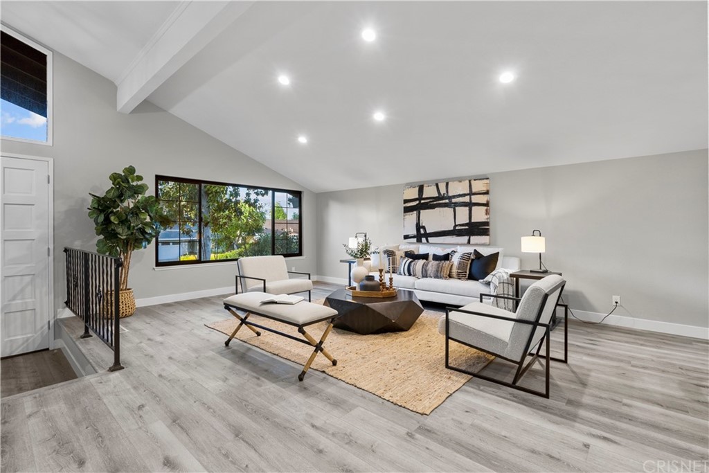 23524 Highland Glen Drive Newhall, CA 91321 - Photo 7 of 53 a living room with furniture and a wooden floor