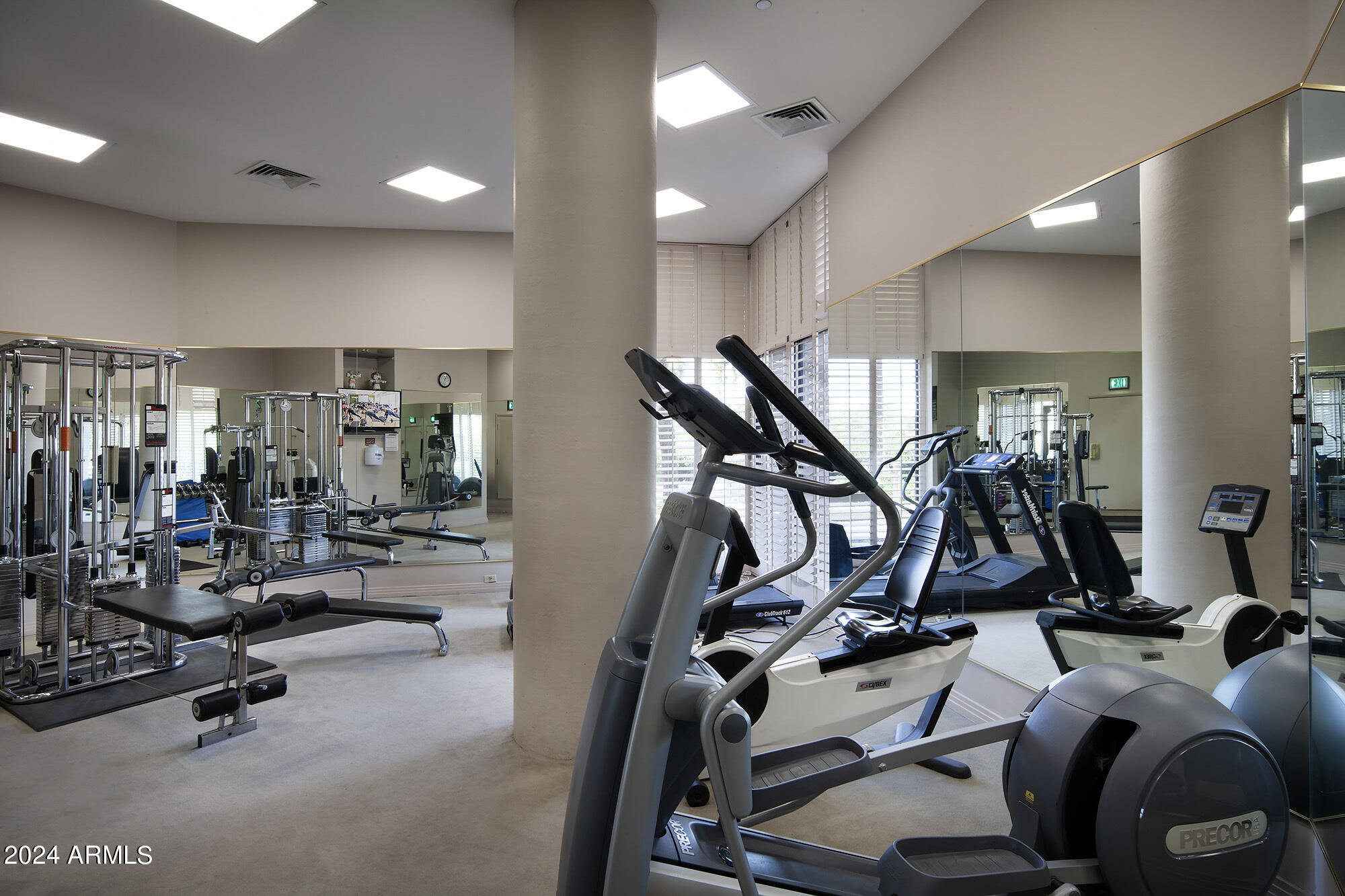 1040 East Osborn Road, Unit 1201 Phoenix, AZ 85014 - Photo 22 of 28 a view of a room with gym equipment