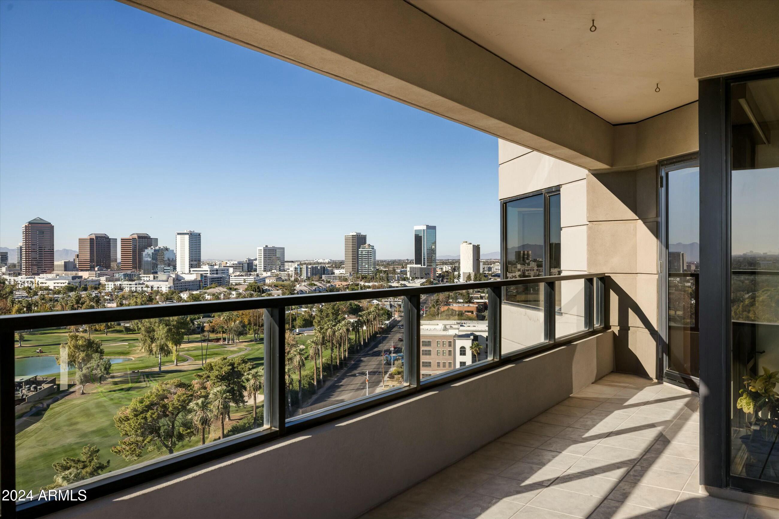 1040 East Osborn Road, Unit 1201 Phoenix, AZ 85014 - Photo 3 of 28 a view of ocean from a balcony