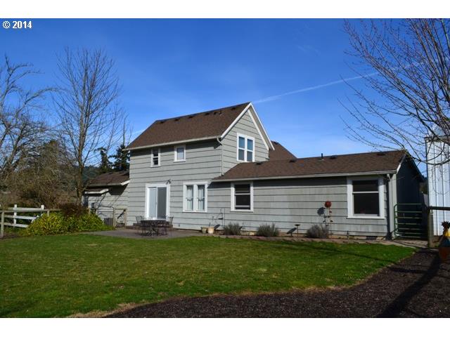 40990 Southwest Laurelwood Road Gaston, OR 97119 - Photo 11 of 14 a front view of a house with a yard