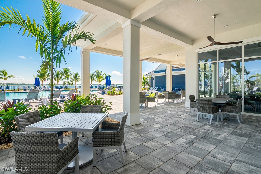 18837 WildBlue Boulevard Fort Myers, FL 33913 - Photo 45 of 49 a outdoor space with lots of table and chairs