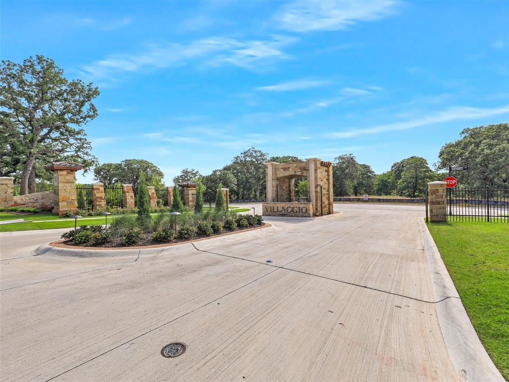 1908 Serendipity Circle Roanoke, TX 76262 - Photo 2 of 11 a view of a garden with a building in the background