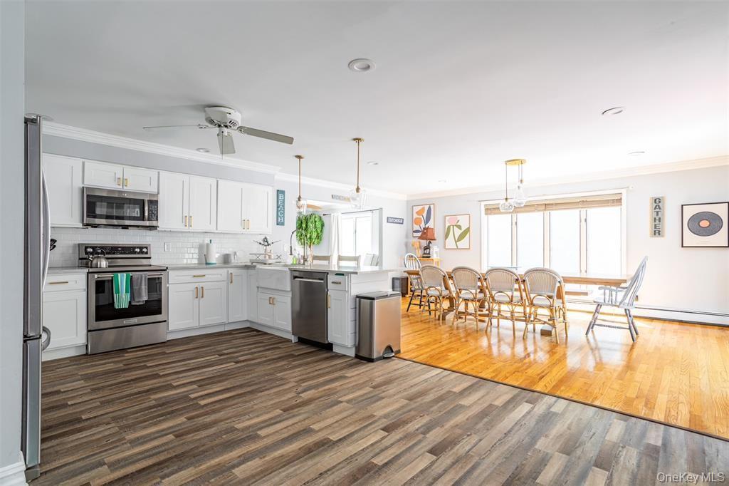 2300 Pine Tree Road Cutchogue, NY 11935 - Photo 25 of 45 Open kitchen and dining area