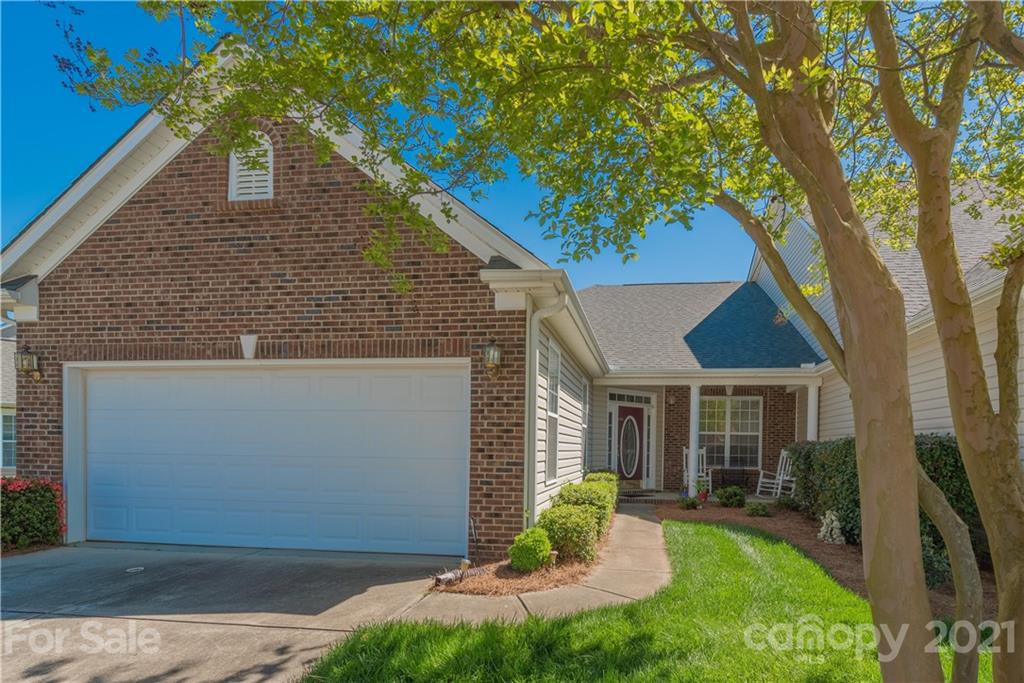 279 Garnet Court, Unit 549 Fort Mill, SC 29708 - Photo 1 of 47 a front view of a house with a yard