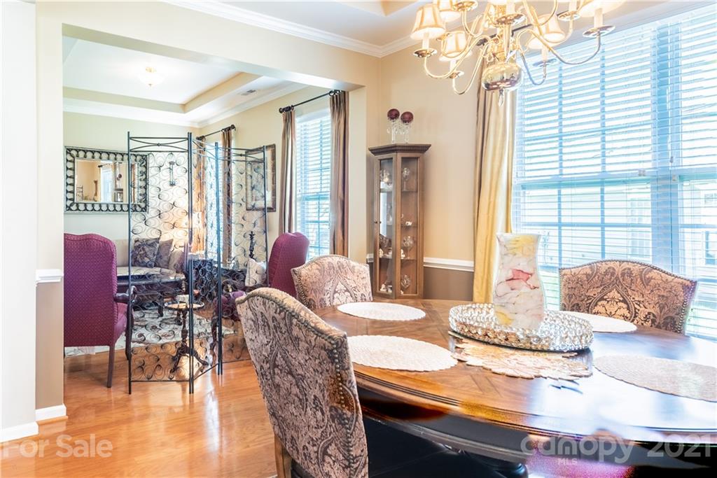 279 Garnet Court, Unit 549 Fort Mill, SC 29708 - Photo 13 of 47 a living room with furniture and large windows